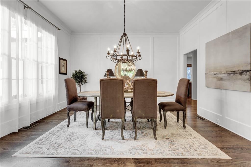 3081 Rhodenhaven Drive Northwest Atlanta, GA 30327 - Photo 27 of 57 a view of a dining room with furniture window and wooden floor