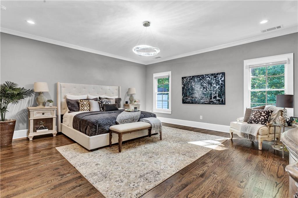 3081 Rhodenhaven Drive Northwest Atlanta, GA 30327 - Photo 33 of 57 a bedroom with a bed and a couch