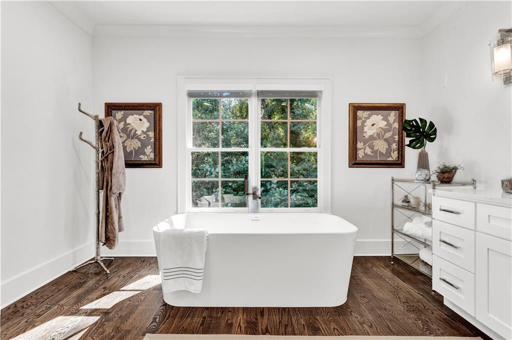 3081 Rhodenhaven Drive Northwest Atlanta, GA 30327 - Photo 36 of 57 a white bath tub sitting in a bathroom