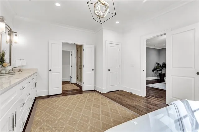 a bathroom with a glass shower door