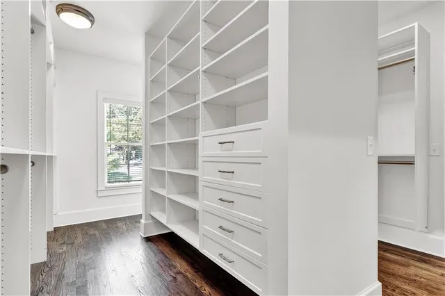 a view of an empty walk in closet