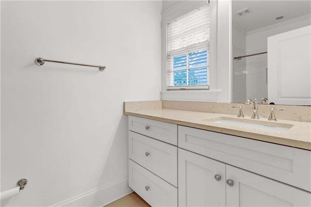 3081 Rhodenhaven Drive Northwest Atlanta, GA 30327 - Photo 45 of 57 a bathroom with a sink and a mirror