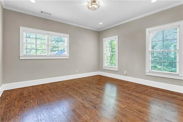 a bathroom with a toilet sink and shower
