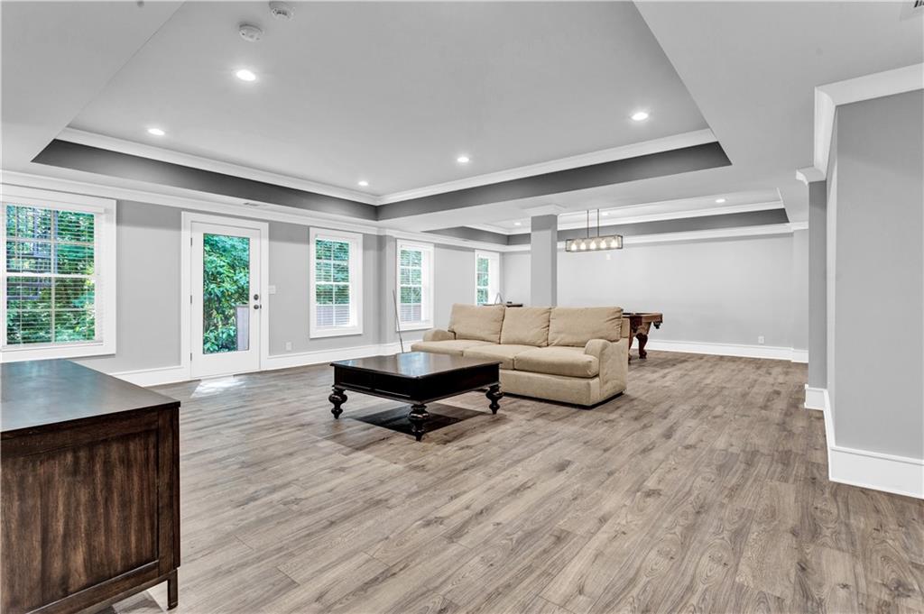 3081 Rhodenhaven Drive Northwest Atlanta, GA 30327 - Photo 50 of 57 a living room with furniture and wooden floor