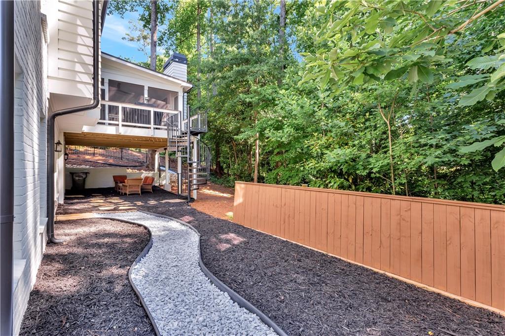 3081 Rhodenhaven Drive Northwest Atlanta, GA 30327 - Photo 56 of 57 a view of a street with sitting area