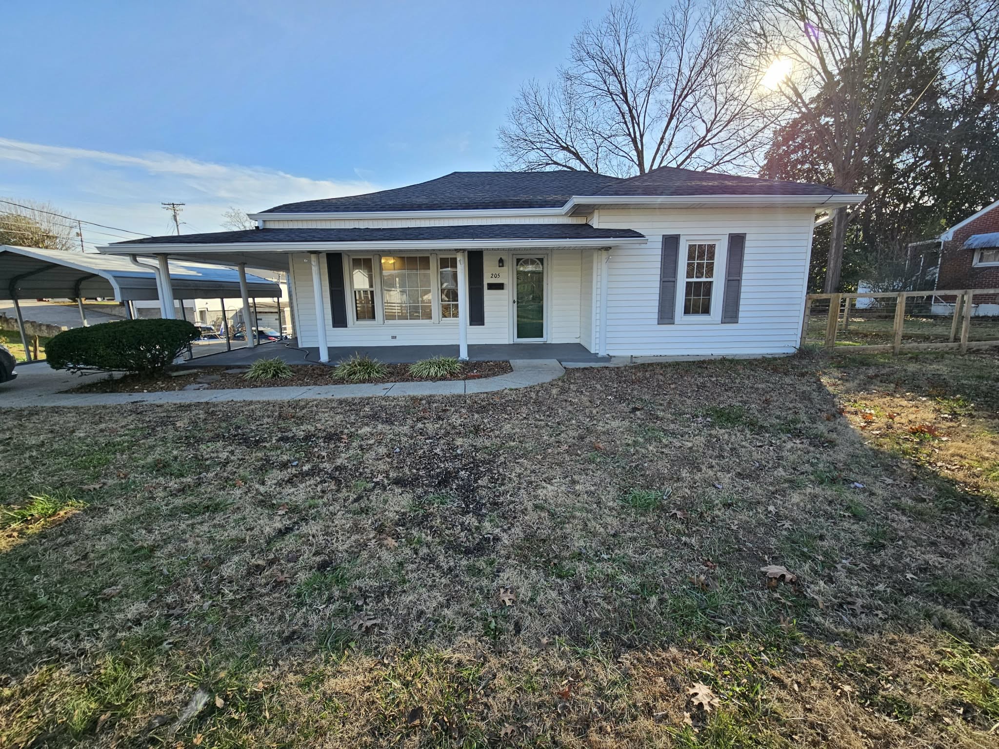 205 Fite Avenue West Carthage, TN 37030 - Photo 22 of 55 a front view of a house with a yard