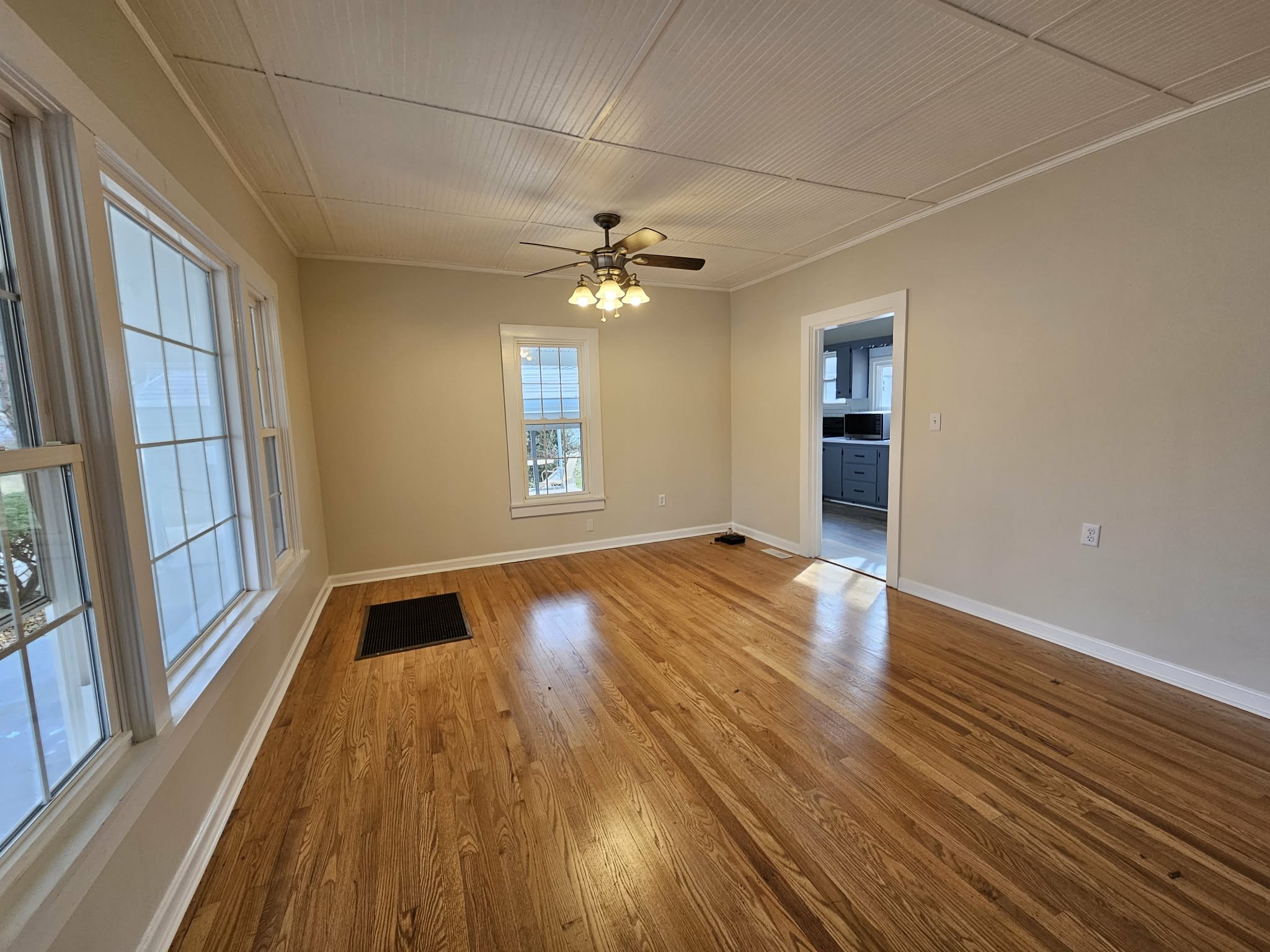 205 Fite Avenue West Carthage, TN 37030 - Photo 23 of 55 a view of an empty room with a window and wooden floor