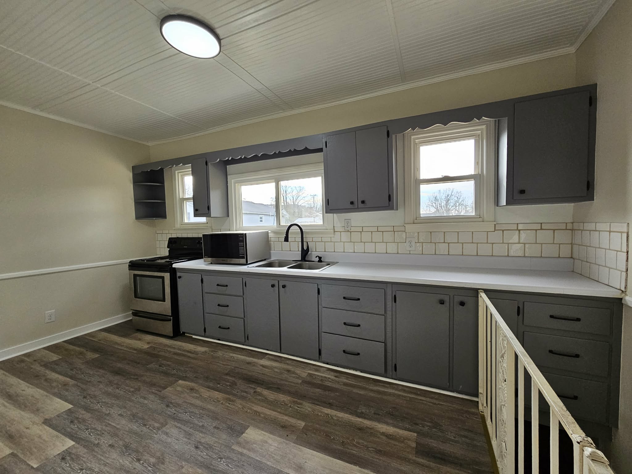 205 Fite Avenue West Carthage, TN 37030 - Photo 38 of 55 a kitchen with sink window and cabinets