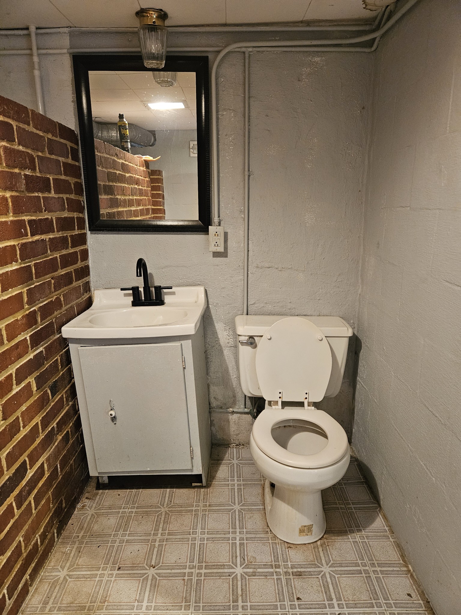 205 Fite Avenue West Carthage, TN 37030 - Photo 55 of 55 a bathroom with a toilet sink and mirror
