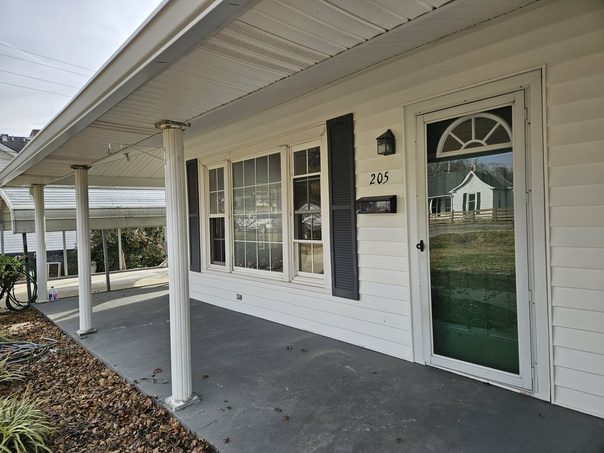 205 Fite Avenue West Carthage, TN 37030 - Photo 6 of 55 a view of a brick house with a large window