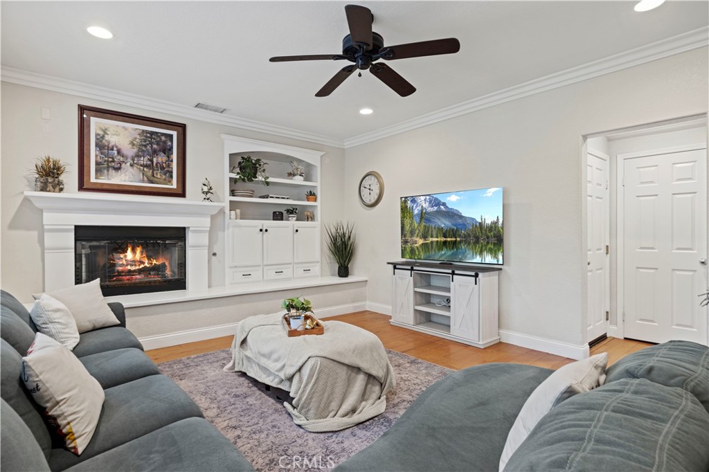 24303 Las Palmas Street Valencia, CA 91355 - Photo 11 of 34 a living room with furniture and a flat screen tv