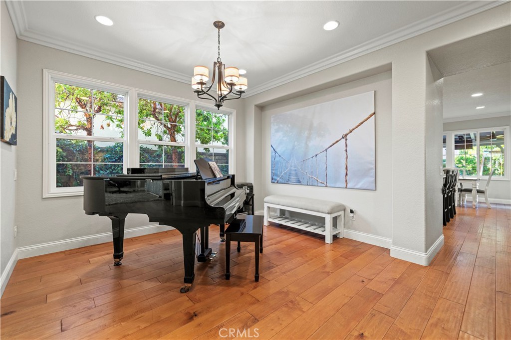 24303 Las Palmas Street Valencia, CA 91355 - Photo 4 of 34 a view of a livingroom with furniture window and wooden floor