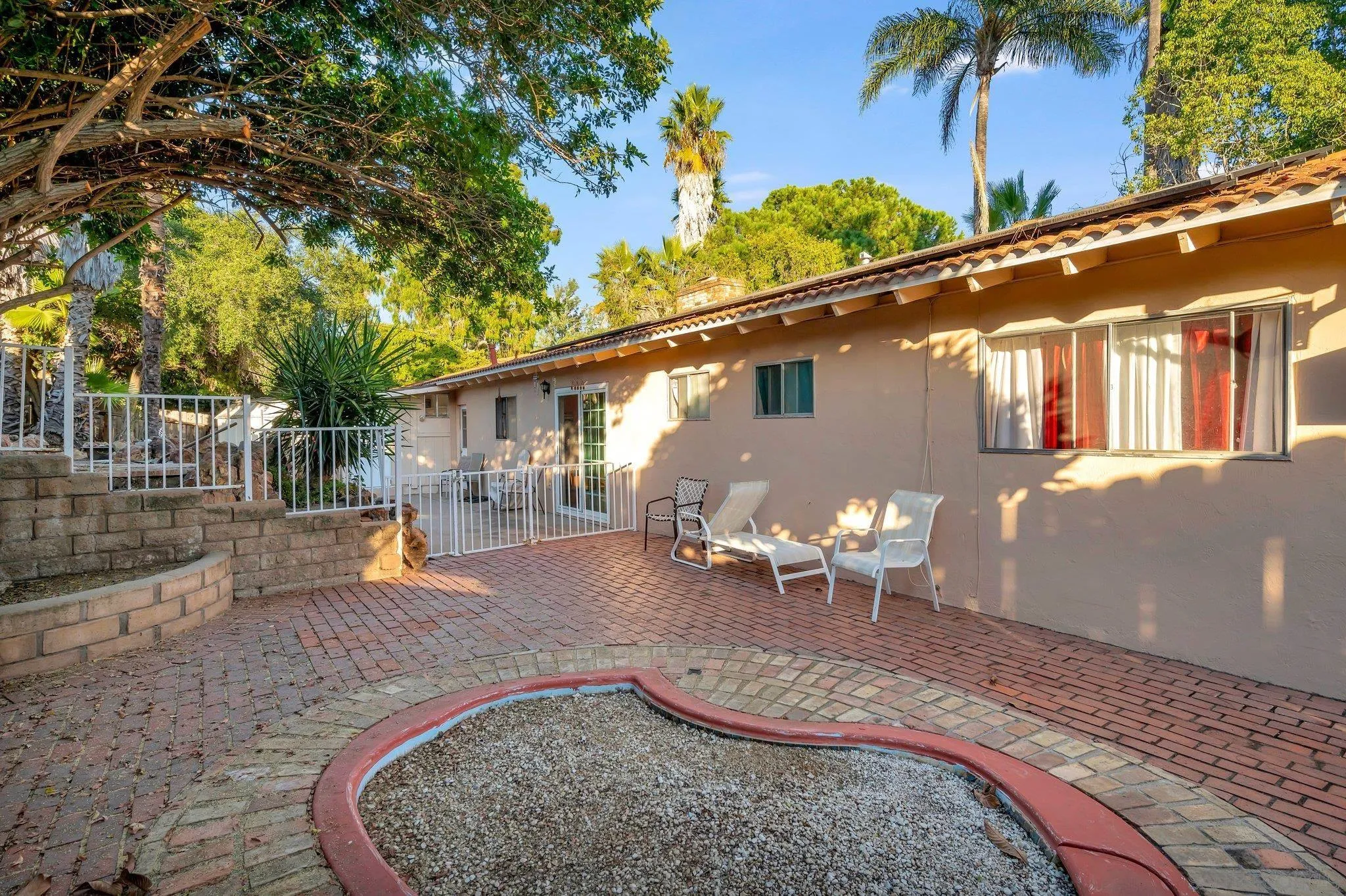 1886 Winrow Road El Cajon, CA 92021 - Photo 8 of 34 a backyard of a house with table and chairs