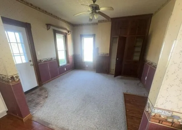 a view of empty room with front door