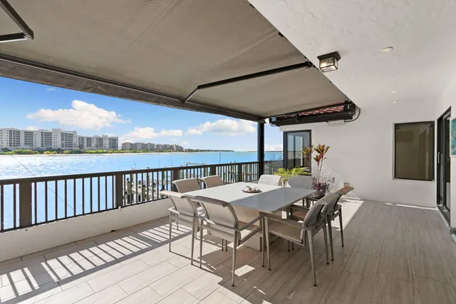 a view of a swimming pool with an ocean view