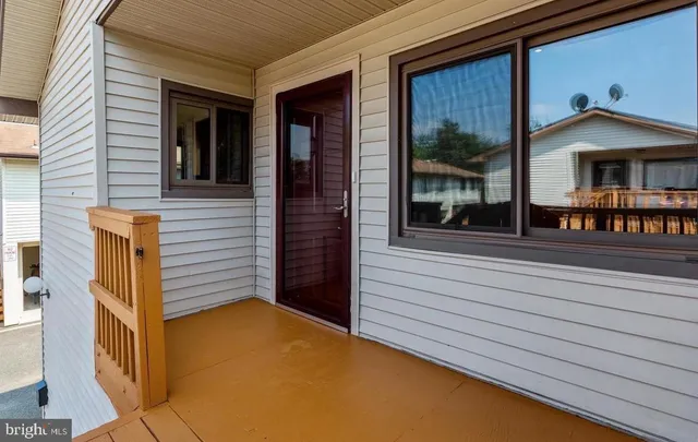 a view of a house with a porch