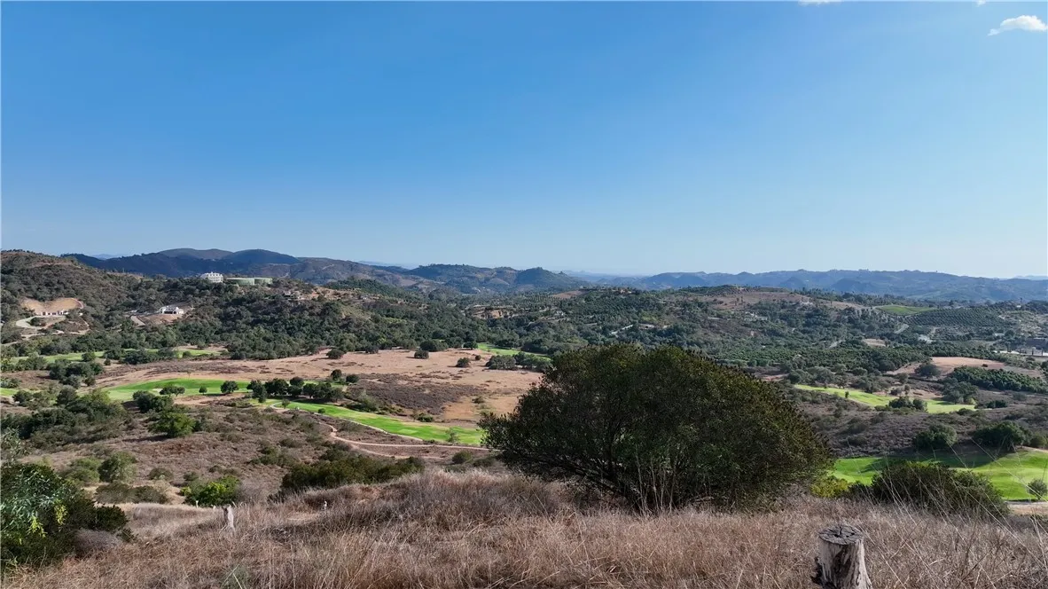 0 La Casita Temecula Ca Temecula, CA 92590 - Photo 2 of 9 a view of a lush green field with mountains in the background