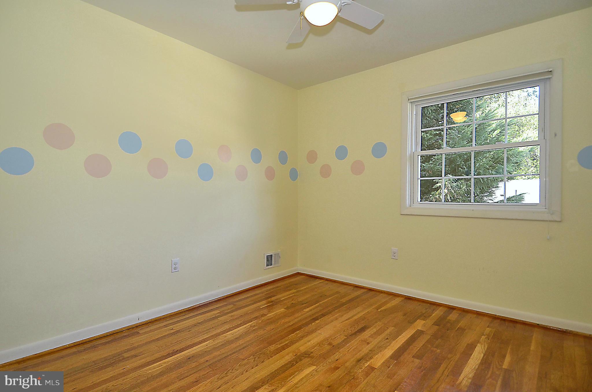 10104 Kohler Road Silver Spring, MD 20902 - Photo 11 of 30 2ND BEDROOM WITH CEILING FAN AND HARDWOOD FLRS