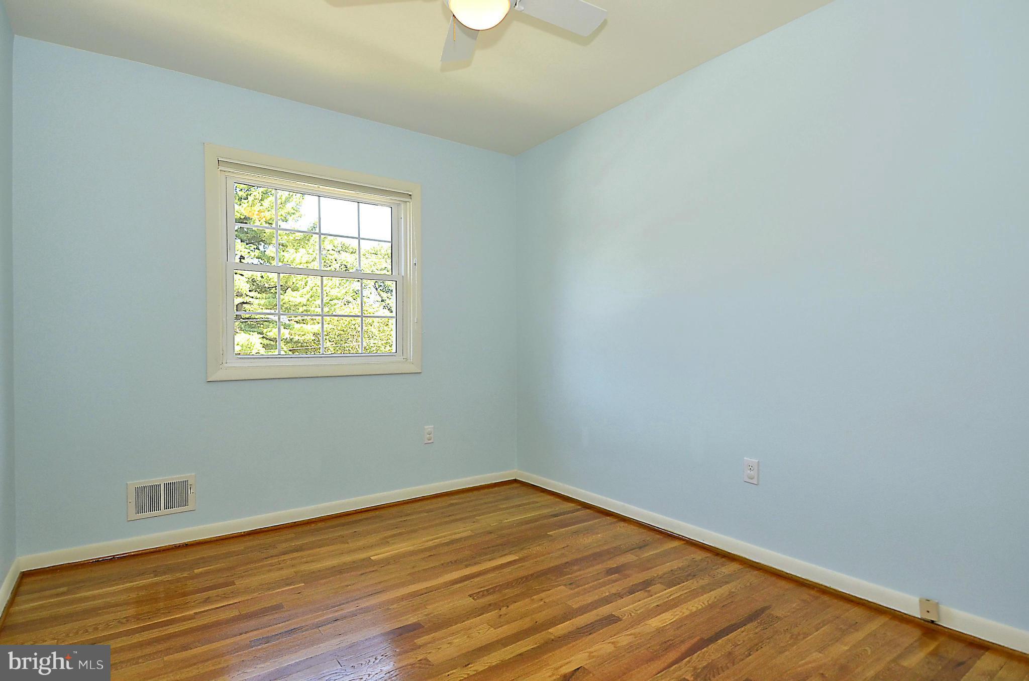 10104 Kohler Road Silver Spring, MD 20902 - Photo 14 of 30 4TH BEDROOM WITH CEILING FAN AND HARDWOOD FLRS