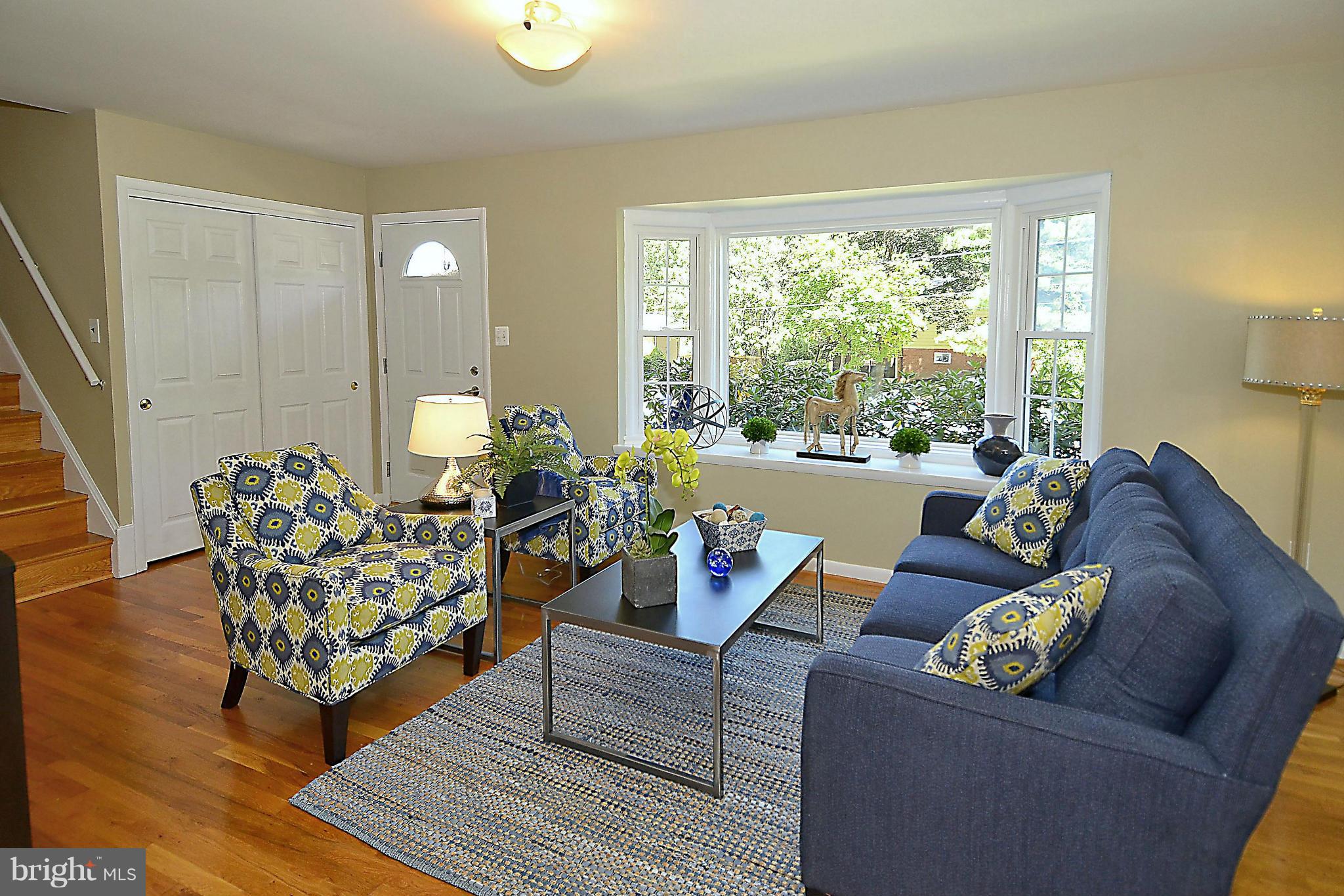 10104 Kohler Road Silver Spring, MD 20902 - Photo 2 of 30 LIVING ROOM WITH HARDWOODS AND BOW WINDOW