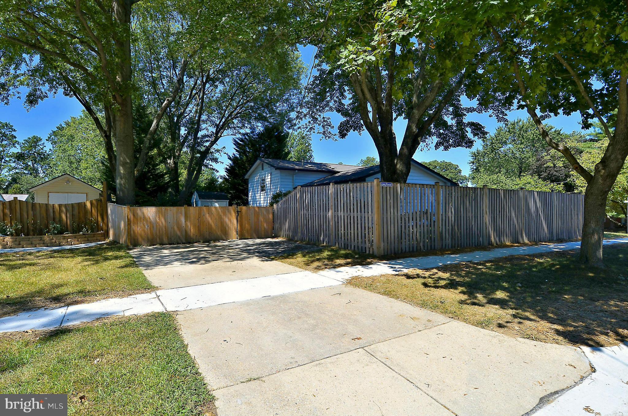 10104 Kohler Road Silver Spring, MD 20902 - Photo 22 of 30 SIDE DRIVEWAY WITH ACCESS TO REAR OF HOME