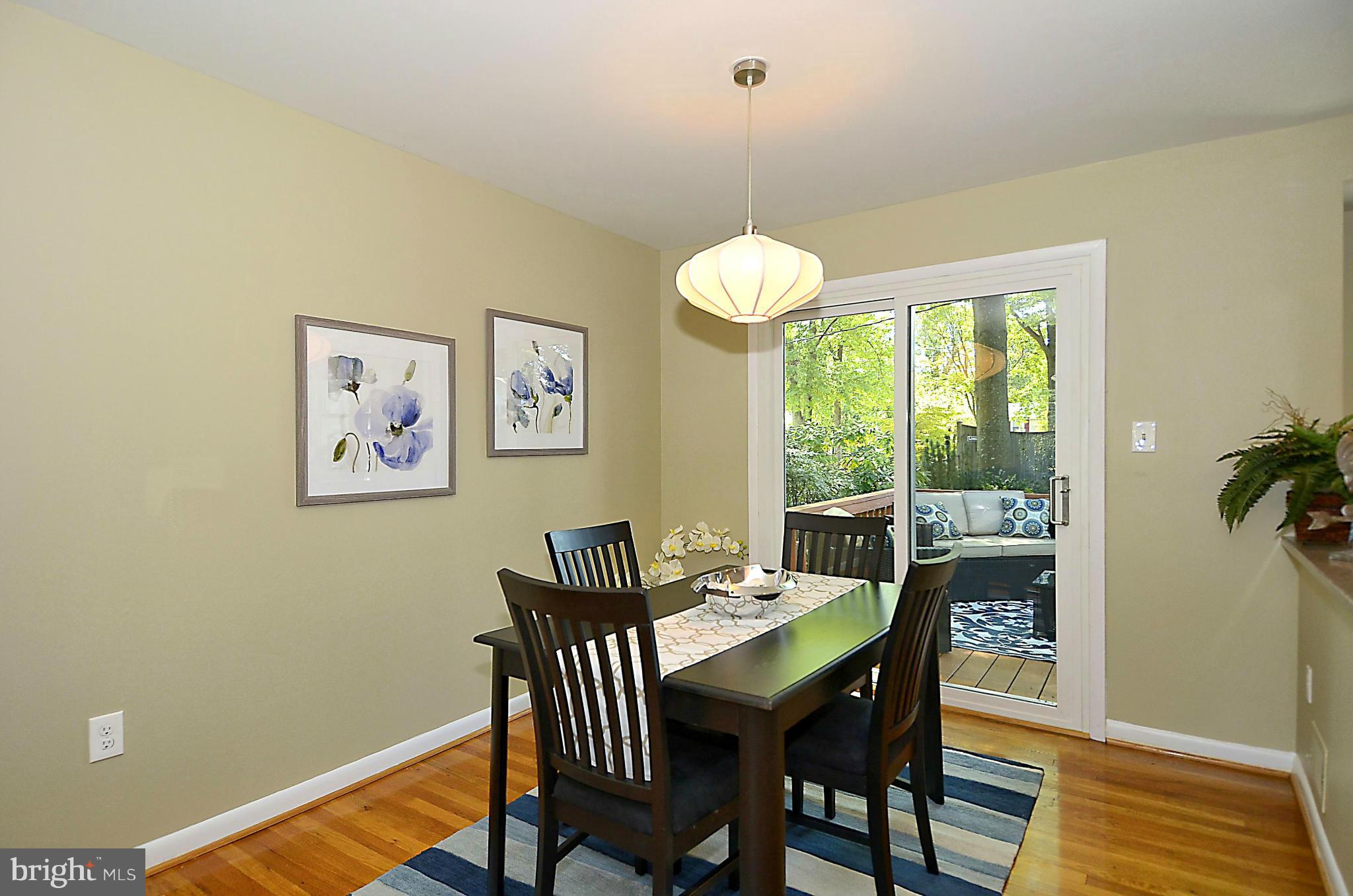 10104 Kohler Road Silver Spring, MD 20902 - Photo 4 of 30 DINING ROOM WITH SLIDING GLASS DOOR TO DECK
