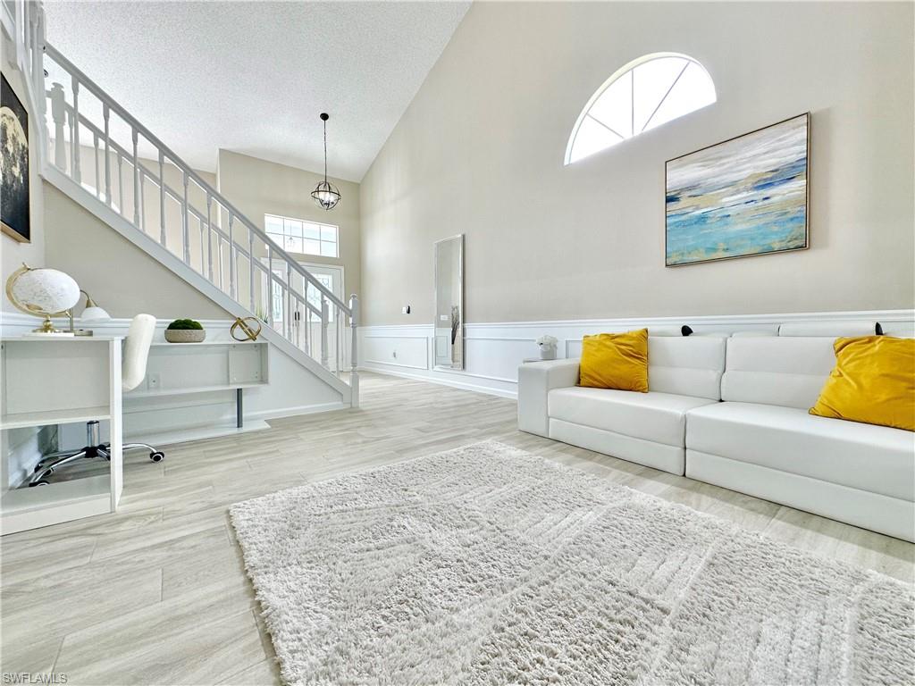 3639 Kent Drive Naples, FL 34112 - Photo 13 of 39 a view of a livingroom with furniture and a couch