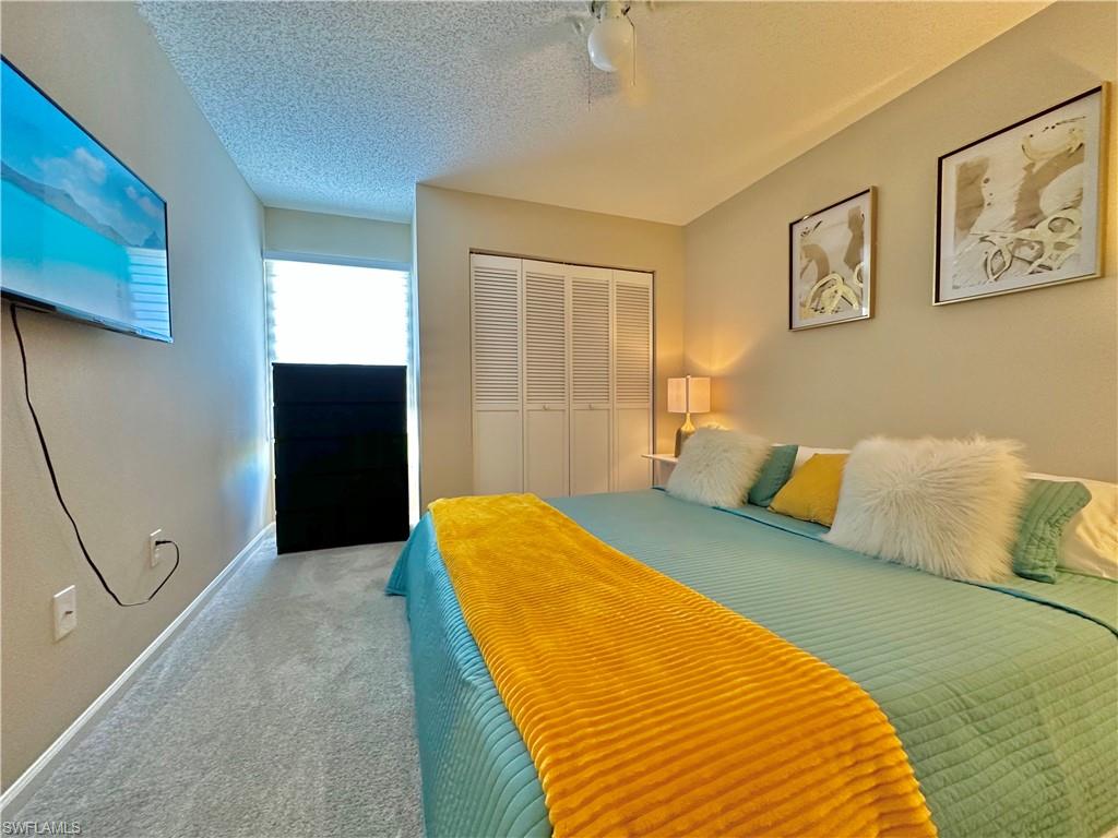 3639 Kent Drive Naples, FL 34112 - Photo 34 of 47 a bed room with a bed
