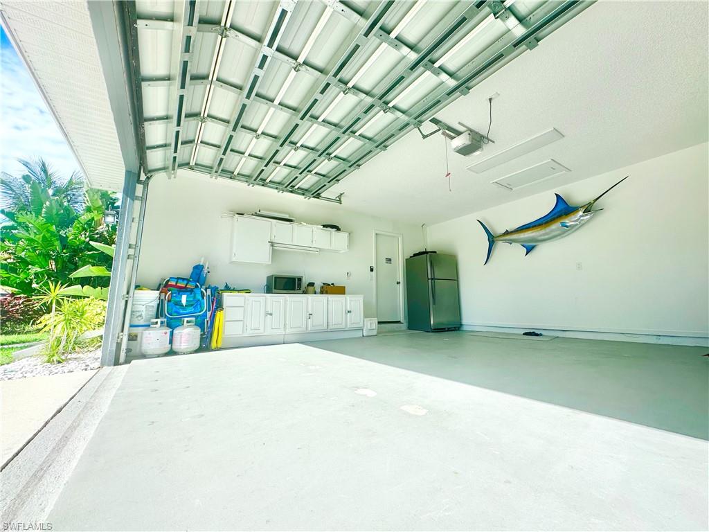 3639 Kent Drive Naples, FL 34112 - Photo 44 of 47 a view of a indoor garage