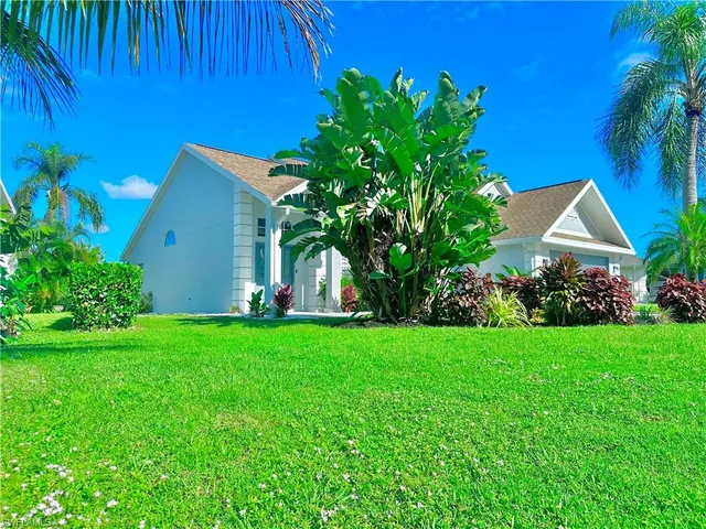 a view of a house with a garden