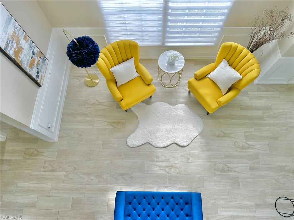 3639 Kent Drive Naples, FL 34112 - Photo 5 of 47 a bathroom with a sink and mirror