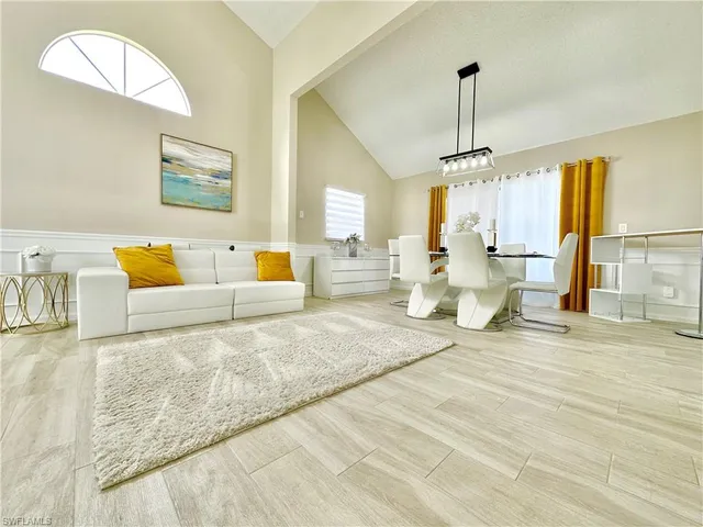 a view of a dining room with furniture