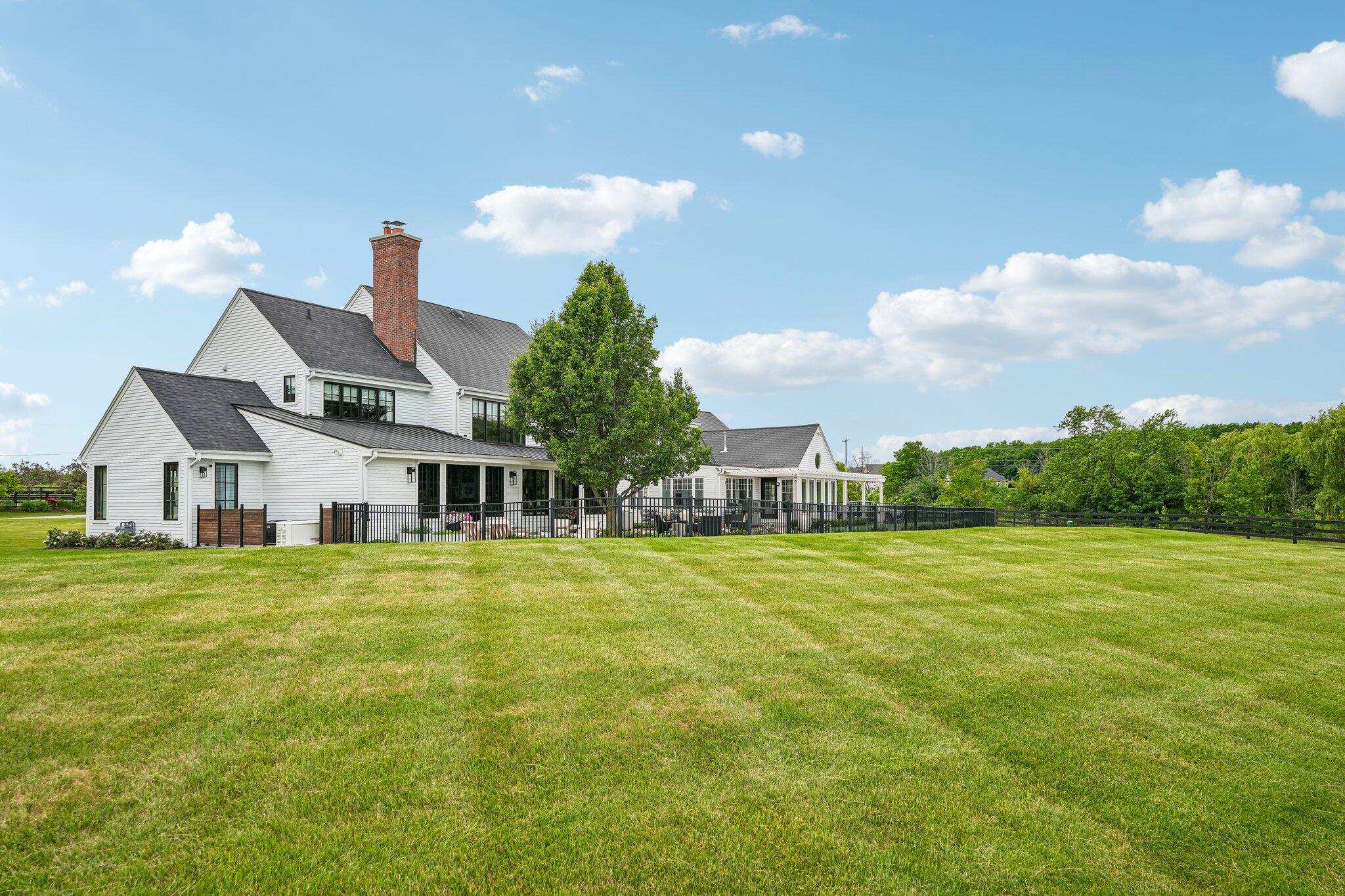 13700 Riverland Road Mequon, WI 53097 - Photo 54 of 69 back of home