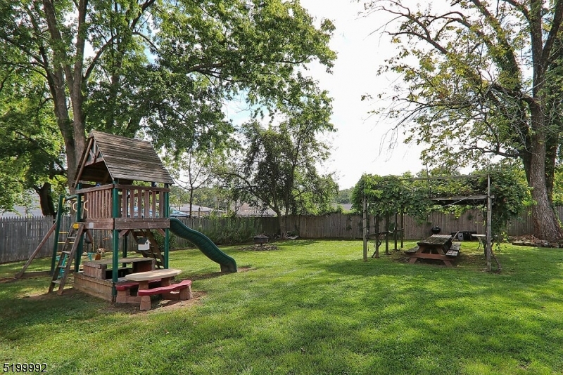 4 Gates Avenue, Unit A Summit, NJ 07901 - Photo 16 of 19 a childrens park with lots of swings and slides