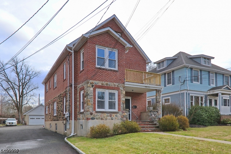 4 Gates Avenue, Unit A Summit, NJ 07901 - Photo 2 of 19 a front view of a house with garden