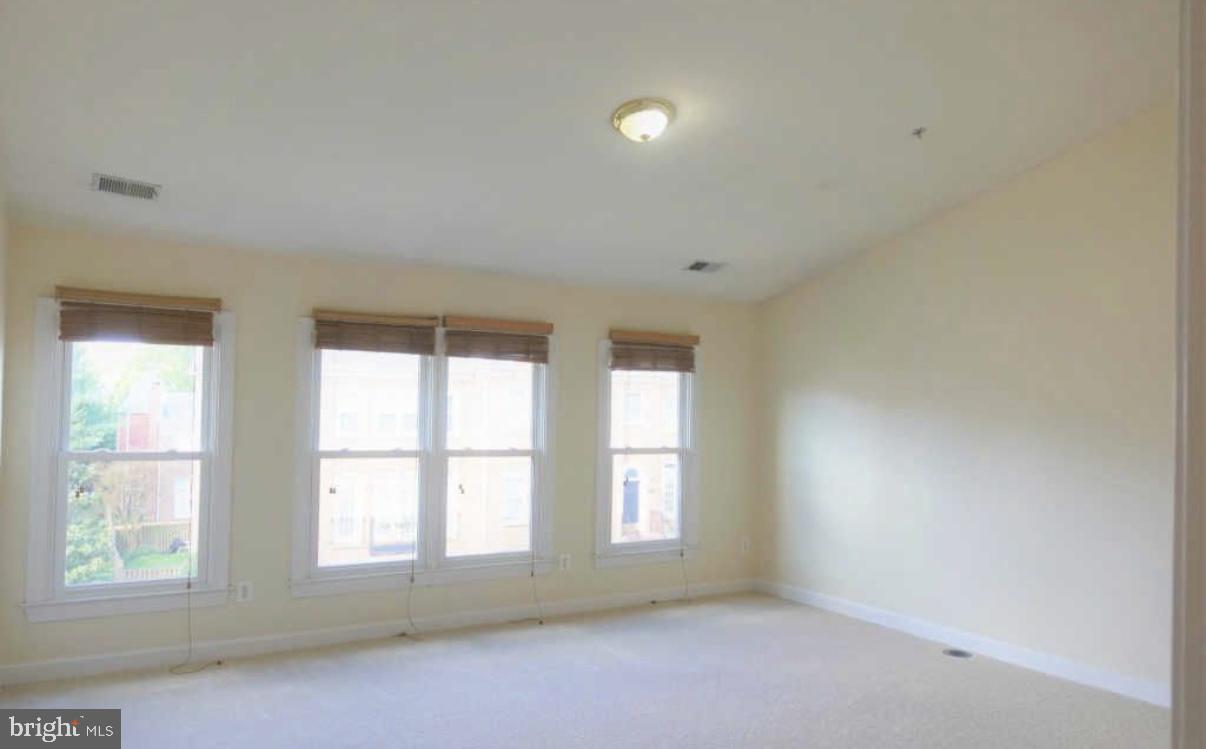 1847 Brenthill Court Vienna, VA 22182 - Photo 12 of 26 an empty room with a window