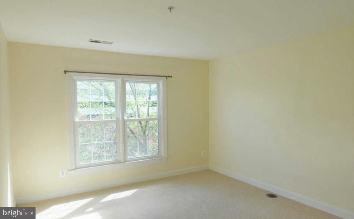 1847 Brenthill Court Vienna, VA 22182 - Photo 15 of 26 a view of an empty room with a window