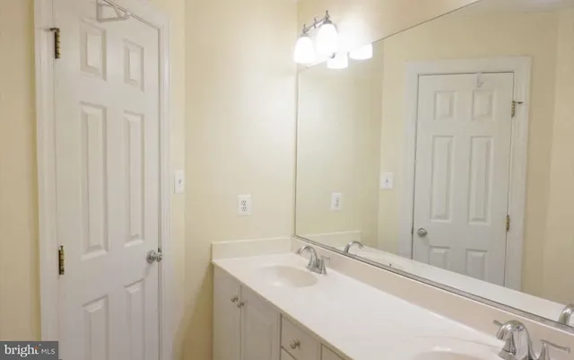 a view of balcony with wooden floor and fence