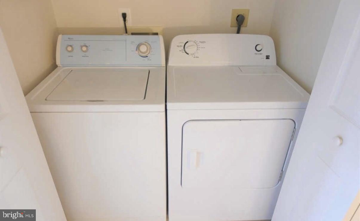 1847 Brenthill Court Vienna, VA 22182 - Photo 21 of 26 a utility room with dryer and washer
