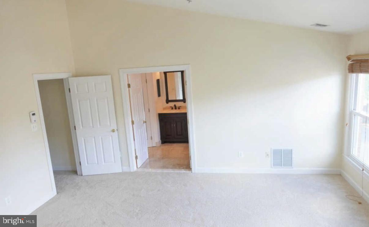 1847 Brenthill Court Vienna, VA 22182 - Photo 9 of 26 a view of a room with an empty space