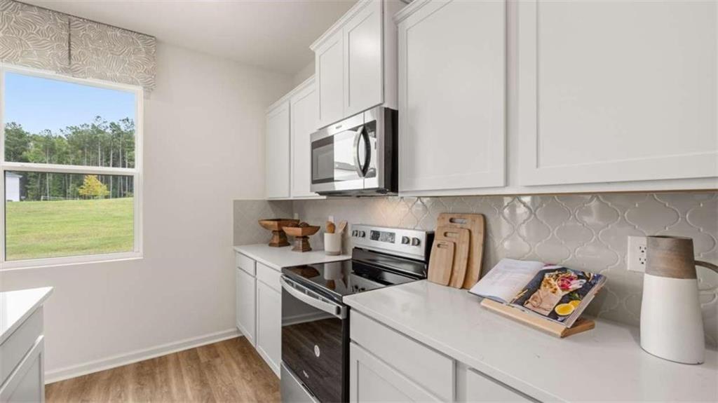 330 Friendship Oak Way Hampton, GA 30228 - Photo 11 of 41 a utility room with sink dryer and washer
