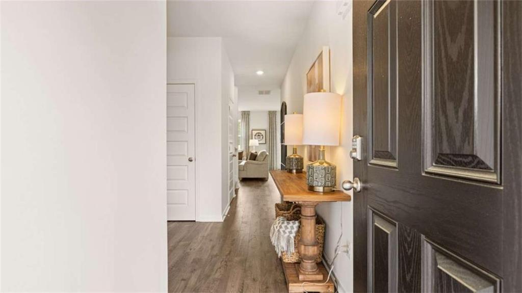 330 Friendship Oak Way Hampton, GA 30228 - Photo 2 of 41 a view of a living room with furniture and a fireplace