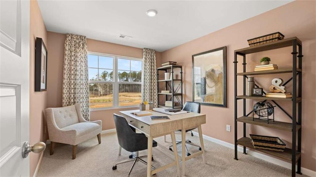 330 Friendship Oak Way Hampton, GA 30228 - Photo 27 of 41 a living room with furniture a table and a large window