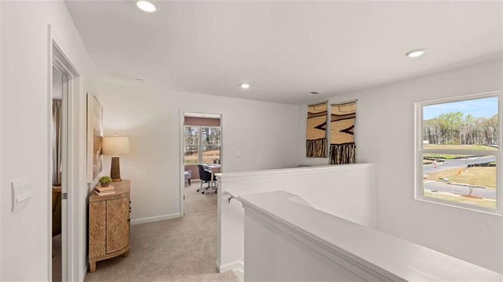330 Friendship Oak Way Hampton, GA 30228 - Photo 29 of 41 a view of hallway with a large window