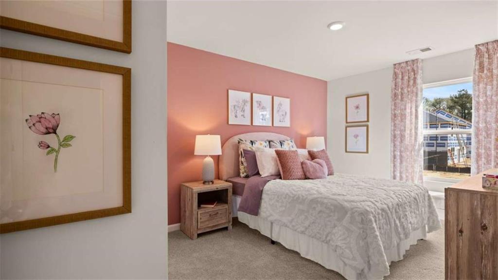 330 Friendship Oak Way Hampton, GA 30228 - Photo 30 of 41 a bedroom with double bed and a window