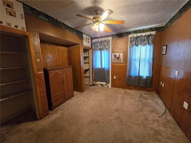 a view of a hallway with a chandelier