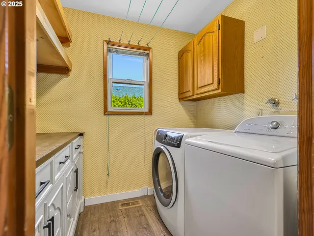 a utility room with dryer and washer