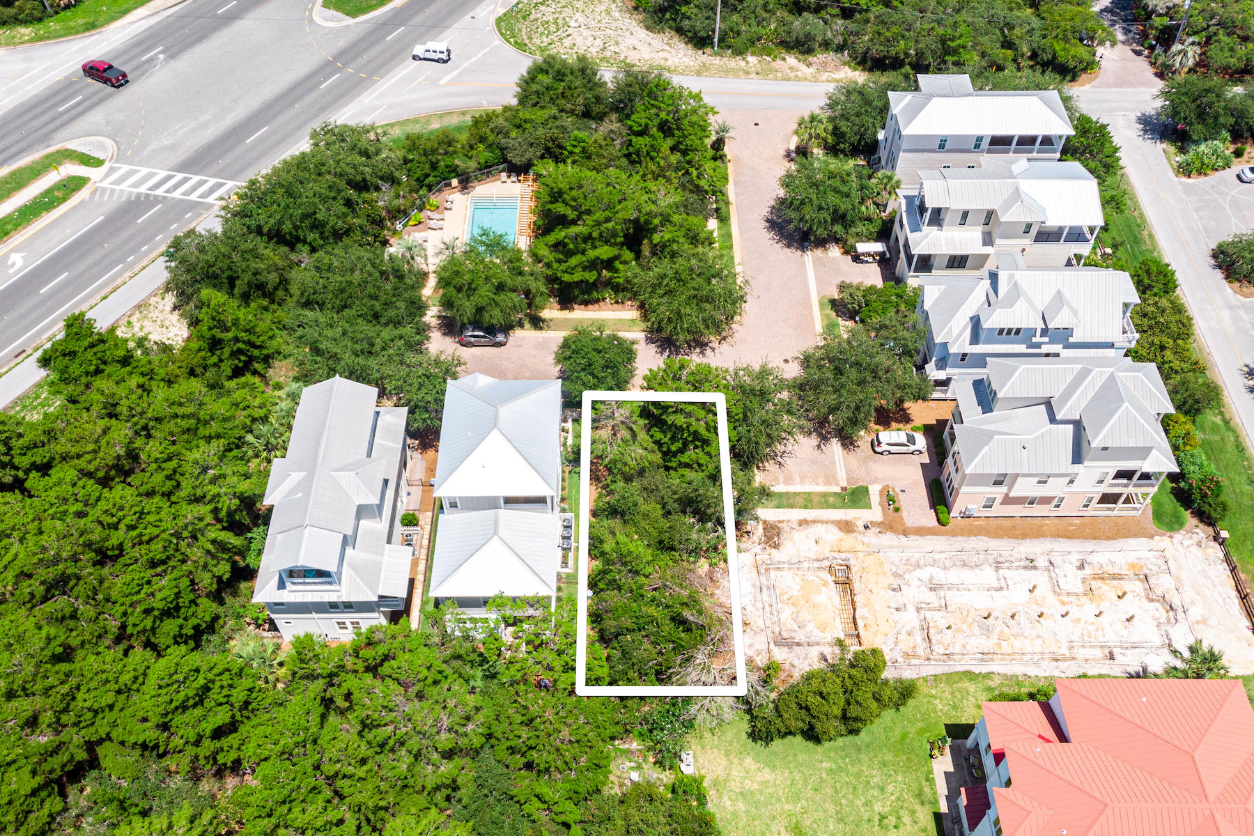 Lot 6 Pompano Pl Inlet Beach Inlet Beach, FL 32461 - Photo 13 of 34 an aerial view of a house with a yard and trees