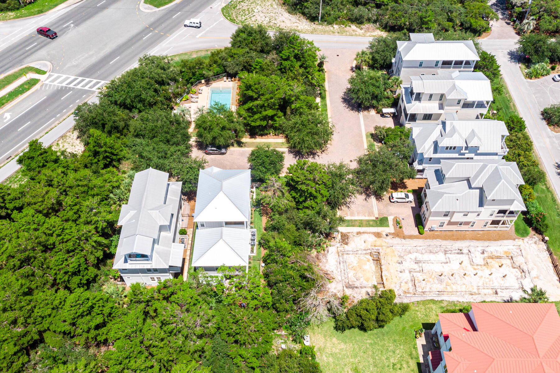 Lot 6 Pompano Pl Inlet Beach Inlet Beach, FL 32461 - Photo 14 of 34 an aerial view of a house with a yard and trees