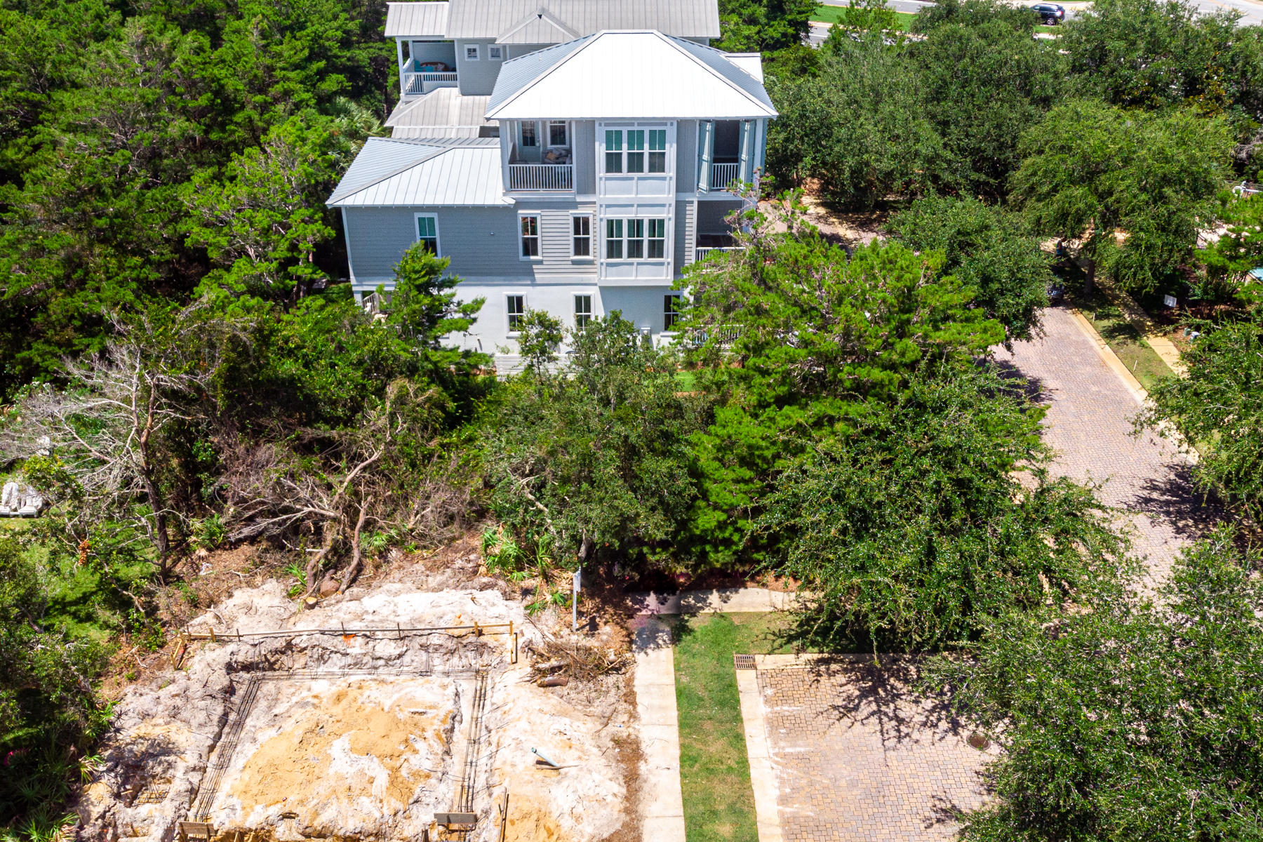 Lot 6 Pompano Pl Inlet Beach Inlet Beach, FL 32461 - Photo 18 of 34 a view of a house with a yard and large trees